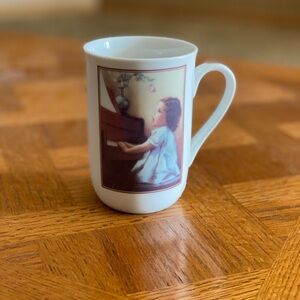Vintage 1985 tea cup featuring artwork by Bessie Pease Gutmann